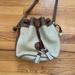 Dooney & Bourke Bags | Dooney & Bourke Vintage Pebbled Leather Drawstring Bucket Bag Cream Brown Read | Color: Brown/Cream | Size: Os