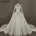 Robe de mariée blanche à manches longues avec appliques à paillettes robe de Rhélégante longueur