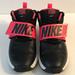 Nike Shoes | Nike Team Hustle D8 Big Kids Black Racer Pink Shoe | Color: Black/Pink | Size: 4g