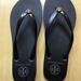 Tory Burch Shoes | Nwob Tory Burch Monogram Flip Flops (Size 8) Rubber Thong | Color: Black | Size: 8