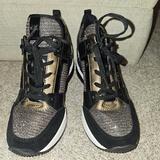 Michael Kors Shoes | Michael Kors Women's Georgie Wedge Sneakers Size 5.5 In Gold Sparkle | Color: Black/Gold | Size: 5.5