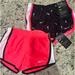 Nike Bottoms | 2 Pair Nike Dri Fit Tempo Shorts Pink And Black With White Swoosh Nwt Size 4 | Color: Black/Pink | Size: 4g