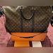 Louis Vuitton Bags | Louis Vuitton Keepall Bandoulire 55 Duffle Bag | Color: Black/Brown | Size: 55
