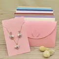 Boîte à bijoux rose avec collier carte de boucle d'oreille boîte d'emballage cadeau en papier