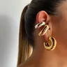 Trend ige Kreis Drehungen Creolen für Frauen einfache Temperament Übertreibung Gold Farbe Ohr