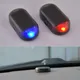 Luce di sicurezza finta per auto Allarme fittizio simulato ad energia solare Avvertimento wireless Lampada di avvertenza antifurto Luci lampeggianti a LED