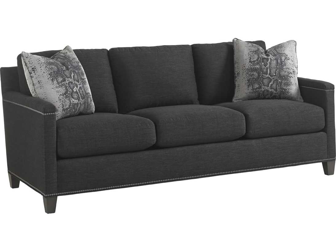 Dark gray upholstered sofa shown from the front on white.