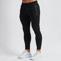 Per uomo Pantaloni della tuta Pantaloni Running Pantaloni da pista Tasche A cordoncino Cinturino elastico Pantalone / Sovrapantaloni Esterno Sportivo Al coperto Cotone Traspirante Morbido Maratona
