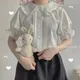 Zoki Camicette da donna dolci giapponesi Stile Lolita Bianco Kawaii Colletto alla Peter Pan Camicia Jk Carino Preppy Ruffle Puff Manica corta Top