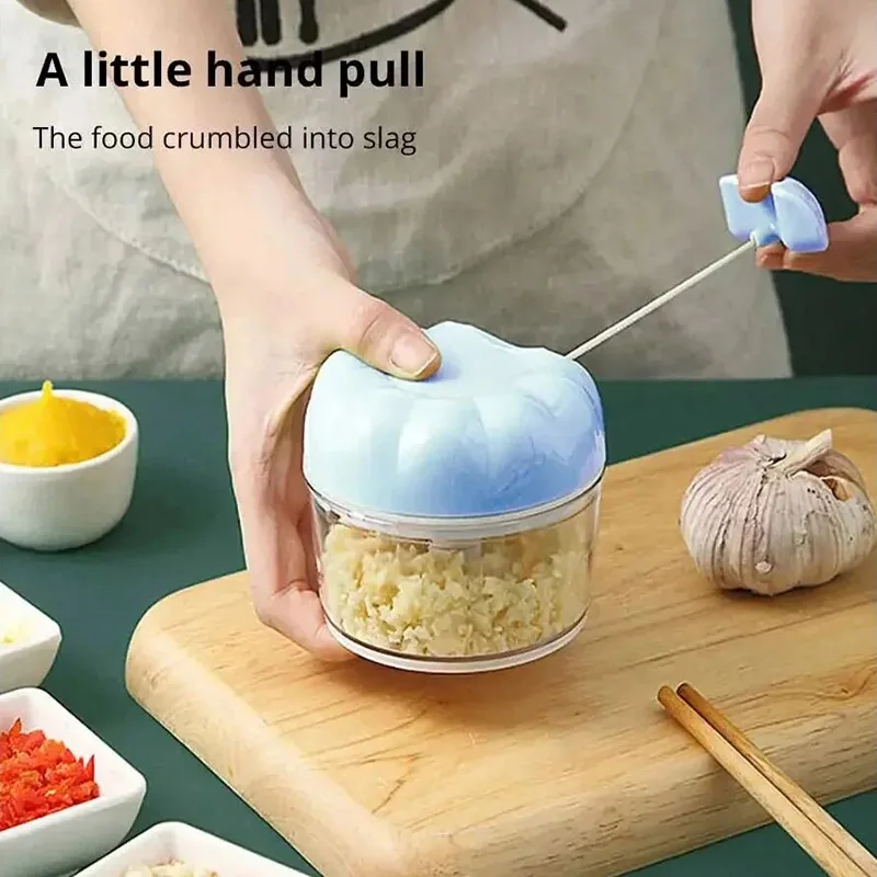 Manueller Knoblauchzerkleinerer, Knoblauchstampfer, Mixer, Lebensmittel, Gemüseschneider, Fleischwolf, Küchenhelfer, Handzug, Knoblauchwolf Image