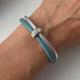 Armband Leder mit einem Strassrondell blau silber