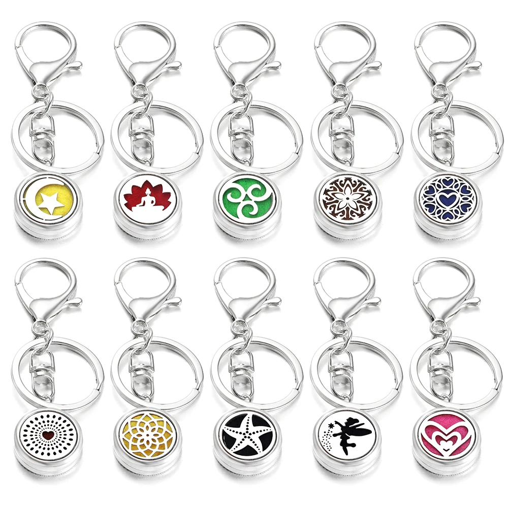 Aromatherapie-Parfüm-Medaillon-Schlüsselanhänger, herzförmiger Diffusor für ätherische Öle, Duft aus Edelstahl, hochwertiges Schlüsselanhänger-Zubehör Image