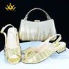 Low Heels Mode Frühling Sommer neues Design nigerian ische Frauen Schuhe und Tasche in Goldfarbe italienische Frauen Design für die Hochzeit gesetzt