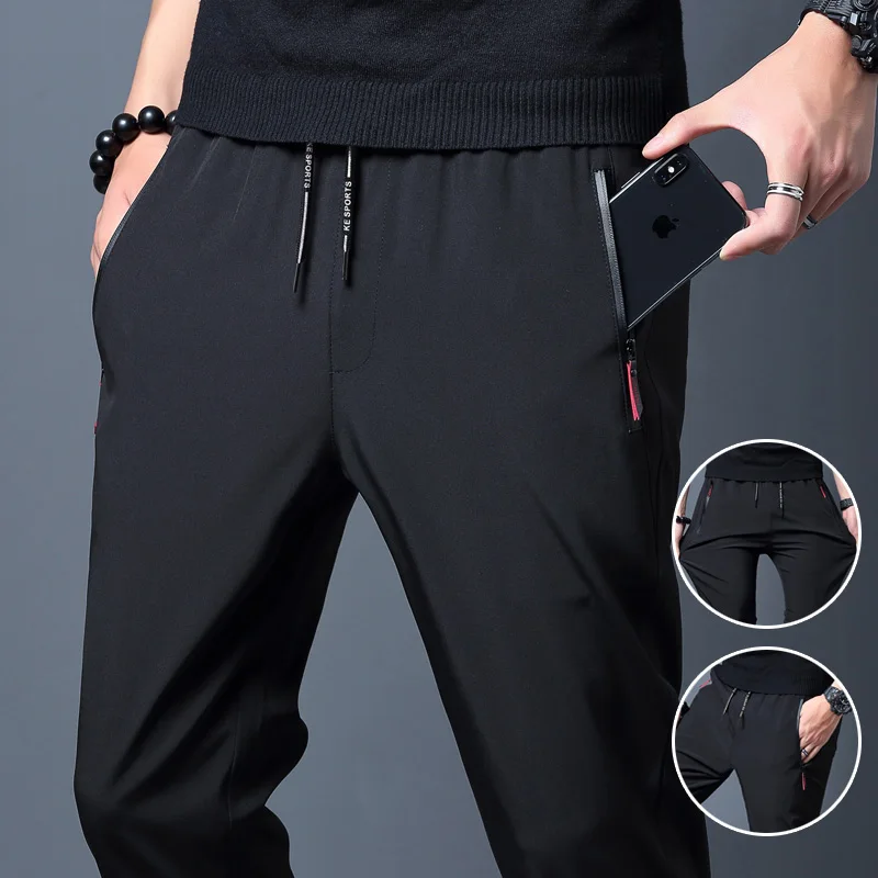 Männer Casual Hosen Stretch Slim Fit Elastische Taille Jogger Koreanische Klassische Blau Schwarz Grau Männliche Marke Hosen Plus Größe 4XL 5XL