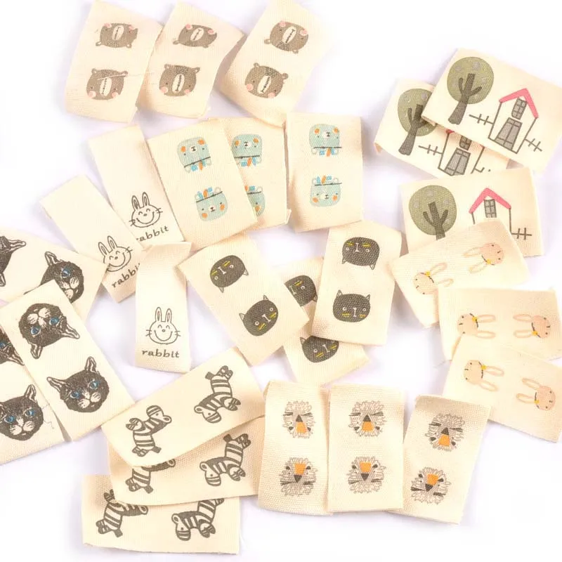 Gemischte, tierbedruckte, gewebte Baumwolletiketten für DIY-Nähzubehör, Bekleidungsstoff, Schuhe, Taschen, Kleidungsetiketten, 50 Stück c2244 Image