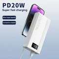 Renear 50000mAh Power Bank portatile 100W Caricatore rapido 100 PD20W Batteria sufficiente con doppia luce LED 4 USB per iPhone Samsung