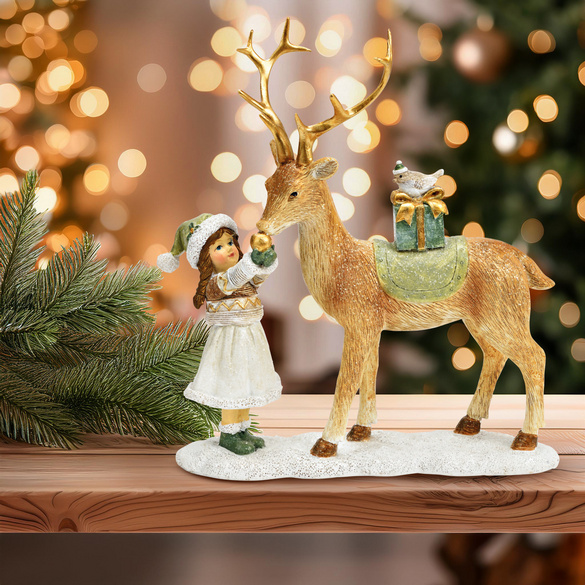 Weihnachtsdeko Hirsch mit Mädchen Image