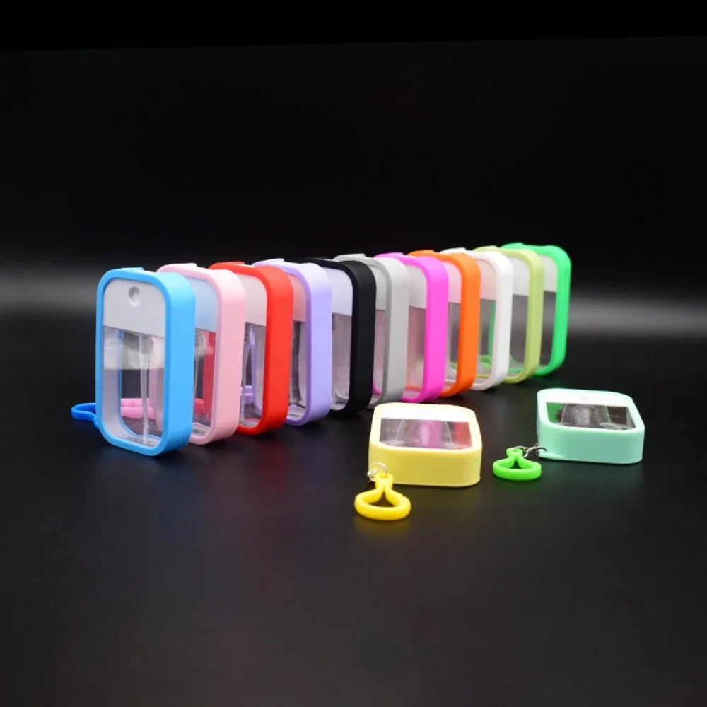 Neues 50-ml-Spray, Desinfektionsspray, duftendes veganes Händedesinfektionsmittel mit Schlüsselanhänger, Parfüm, Alkohol, Wasser, leere, nachfüllbare Flasche für Reisen Image