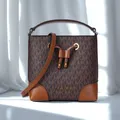Michael Kors Mercer piccola stampa in PVC con borsa a secchiello a tracolla da donna in pelle