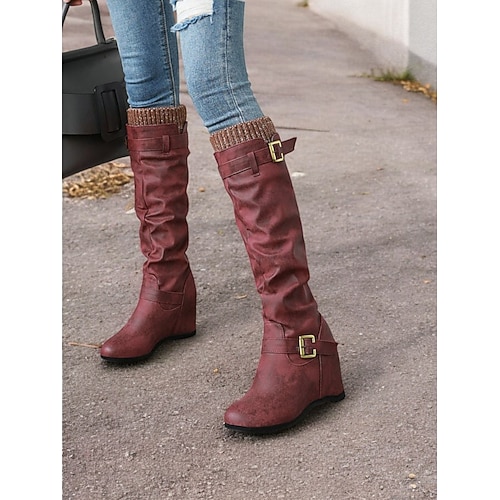 Damenstiefeletten in Used-Optik in Hellbraun mit Schnallenriemen und Keilabsatz – gemütliche Winterstiefel mit Strickbündchen für lässige Outfits Image