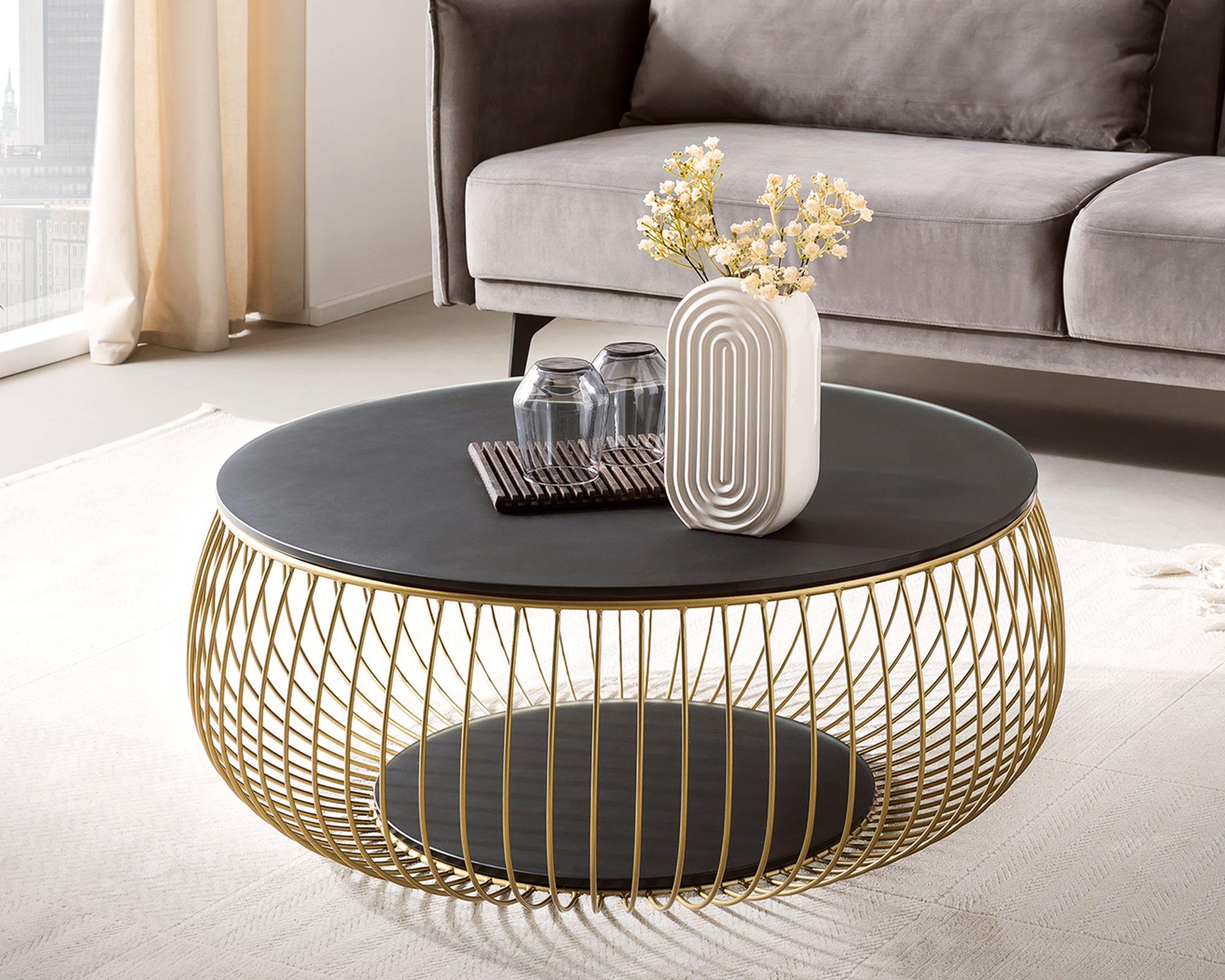 SalesFever »Yuna« Couchtisch schwarz/gold 86x35x86 cm