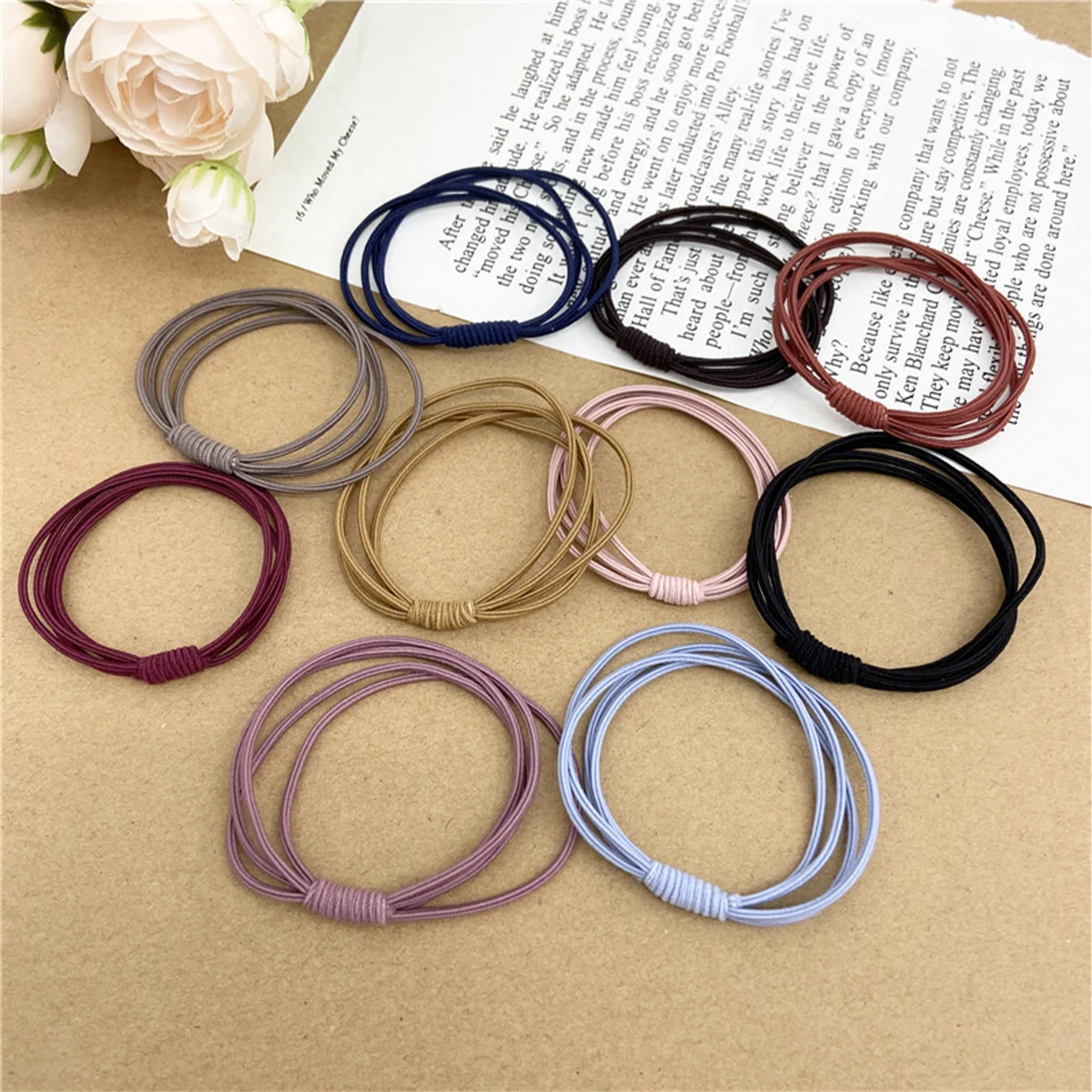 Die grundlegende, hochelastische, einfarbige Farbe ist einfach und gebunden in vier-in-eins, langlebig und nicht leicht zu brechen den Haarring Image