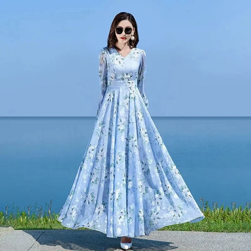 Abito lungo in chiffon floreale a maniche lunghe da donna, nuovo modello primavera 2026, con ampia gonna a balze in vita, scollo a V, vestibilità slim ed elegante