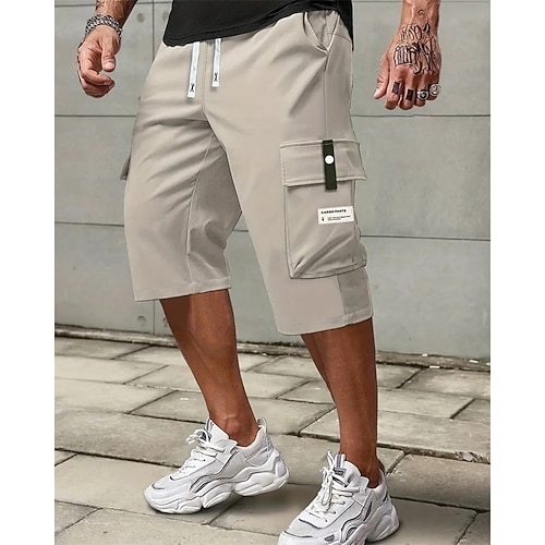 Herren Cargo Shorts Kurze Hosen Sommer-Shorts Capri-Shorts Kordelzug Elastische Taille Multi Pocket Glatt Komfort tragbar Wadenlänge Outdoor Sport Täglich Modisch Brautkleider schlicht Schwarz Khaki Image
