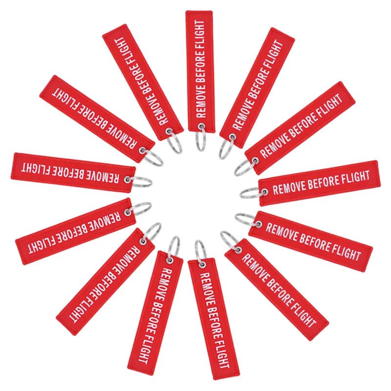 Remove Before Flight Schlüsselanhänger, Jet-Tag, Schlüsselanhänger, Text-Stickerei-Anhänger – Größe: 2,5 x 12,7 cm, Rot, Gelb, Schwarz, Weiß