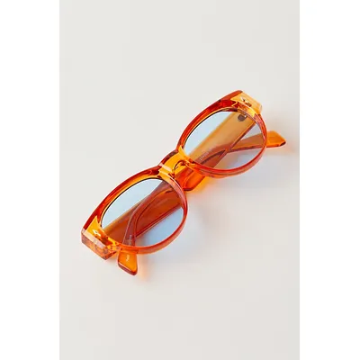 Naya Round Sunglasses at Free People in Champagne With Blue Lens