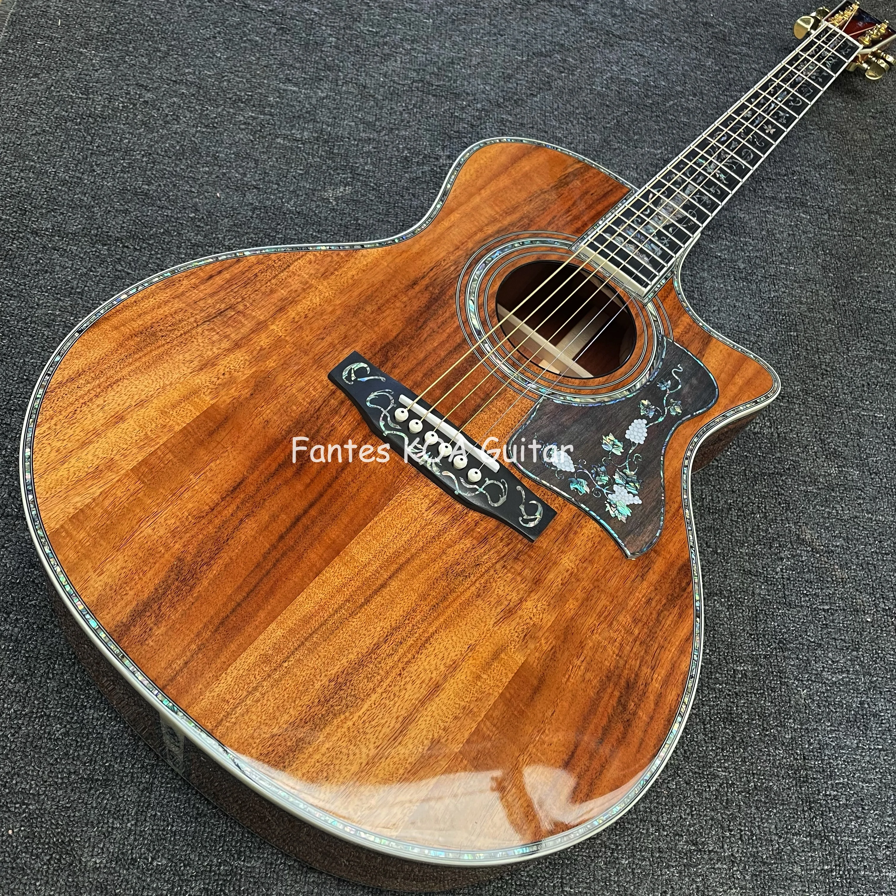 Kundenspezifische 40-Zoll-OM45-Deluxe-Cutaway-Korpus aus massivem KOA-Holz für akustische E-Gitarre mit individuellem Schlagbrett und Regenschirm-Fackel Lo Image
