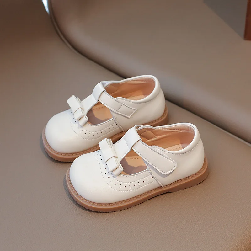 Chaussures de princesse à nœud pour filles, chaussures en cuir, nouvelle mode printemps 2021, chaussures simples à semelle souple pour enfants, chaussures pour enfants à semelle souple avec sangle en