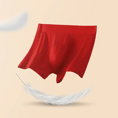 3-teilige Herrenunterwäsche. Herren-Boxershorts. Dieses Jahr besteht aus Baumwolle als Geschenk aus hellem rotem Kaninchen-Hochzeits-Boxershorts mit dünnem Unterteil Image