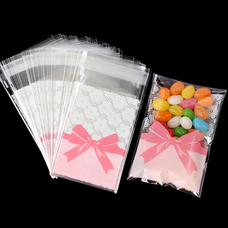50 Stücke Rosa Schleife Süßigkeiten Tasche Blume OPP Selbstdichtende Cookie Geschenk Snack Verpackung Taschen Geburtstag Hochzeit Party Dekoration Lieferungen Image