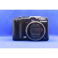Fotocamera digitale Canon PowerShot G9 vintage retrò, modello top, punta e scatta, compatta digitale, anni 2000.
