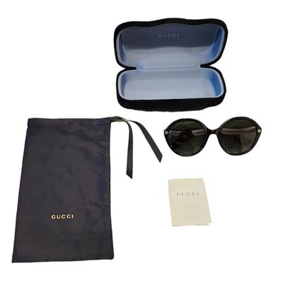 Gucci Accessories | Gucci Women's Gucci Oval Black Ladies Sunglasses - Gg0023s-003 Sunglasses | Color: Black/Brown | Size: Os