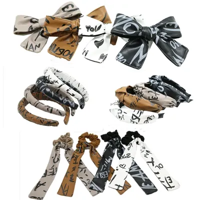New WINTER PRINTING leather styles bow CLIP girls hair pony fashion hair accessories