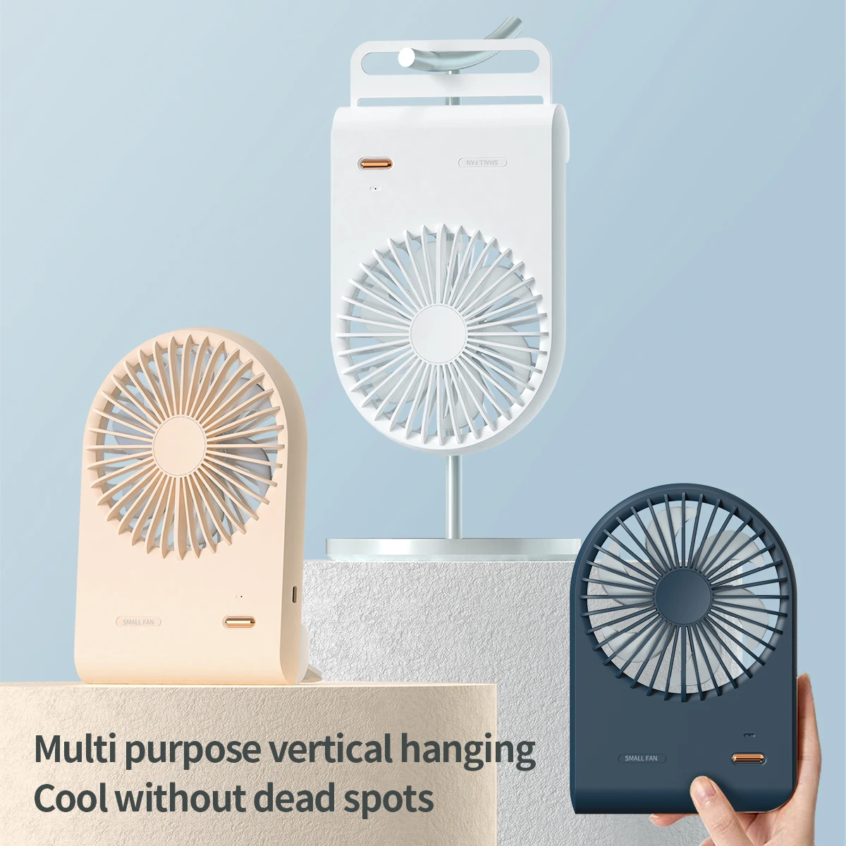 Der neue kleine USB-Sommerventilator 2025 ist auf dem Schreibtisch handgehalten und tragbarer wiederaufladbarer Ventilator im Studentenwohnheim Image