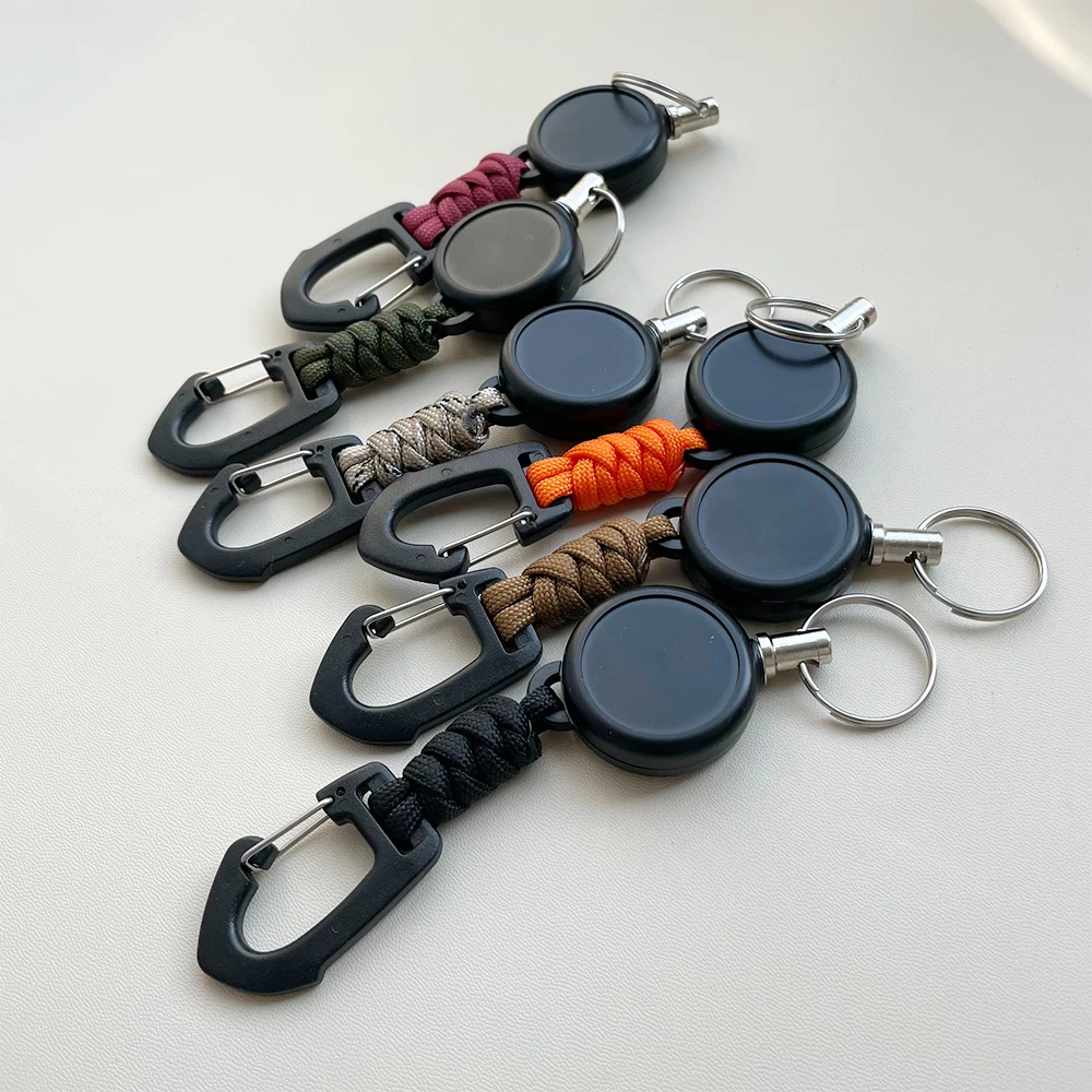 Einziehbarer runder Schlüsselanhänger für den Außenbereich, Sonnenschirmseilweberei, einziehbare Hängeschnalle für den Außenbereich, einfach zu ziehende Schnalle Image
