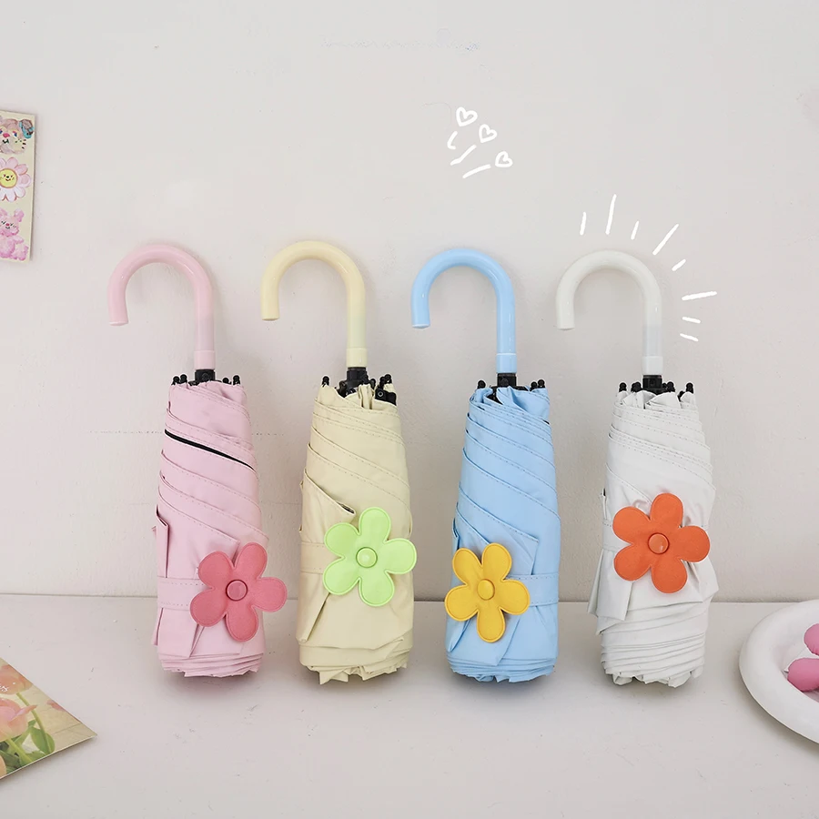 Ein Outdoor-Reiseschirm, ein 50 % Rabatt auf Mini-Sonnenschirm, Sonnenschutz und UV-Schutz-Sonnenschirm Image