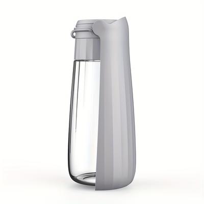 TEMU A Portable Dog Water Bottle Is Essential For Walking Your Pet, Providing A Convenient Way To Drink. Image