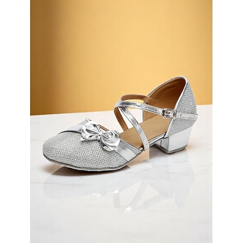 Glitzernde, goldene Tanzschuhe für Mädchen mit niedrigem Absatz, Schleife und gekreuzten Riemen – funkelnde Performance-Schuhe für Jugendbühnenshows, Gesellschaftstanzproben und Talentwettbewerbe Image