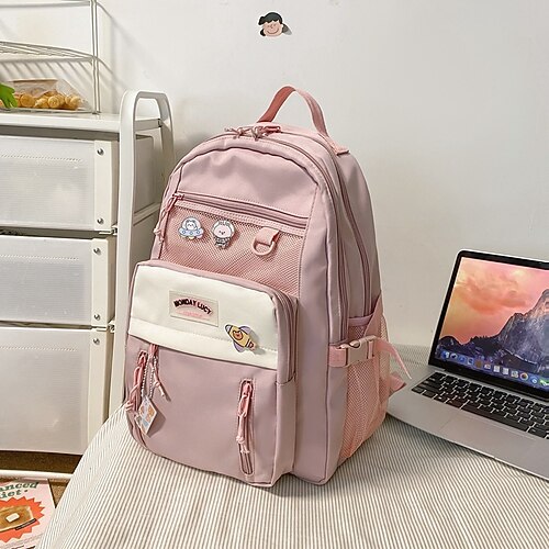 Zaino viola estetico per ragazze con portachiavi di peluche a forma di coniglietto e tasca a rete – zaino scolastico leggero e impermeabile per studenti adolescenti e per l'uso quotidiano