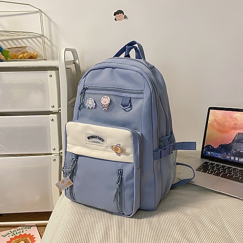 Zaino viola estetico per ragazze con portachiavi di peluche a forma di coniglietto e tasca a rete – zaino scolastico leggero e impermeabile per studenti adolescenti e per l'uso quotidiano