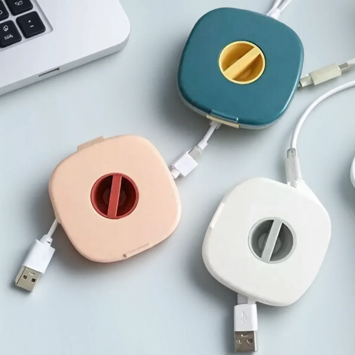 Tragbarer USB-Kabelaufwicklung, rundes Design für Handy-Ladekabel-Organizer, kleiner rotierender Drahtwickler Image