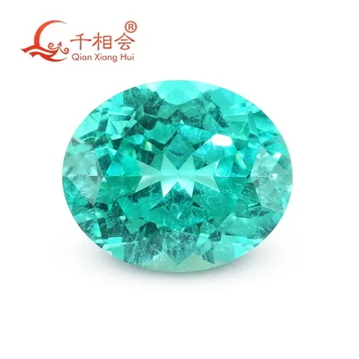 Paraiba with a neon glow oval shape lab grown Yttrium Aluminum Garnet with inclusions Neon-like gem stone jewelry YAG