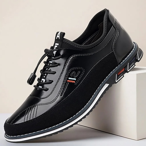 Braune Herren-Sneaker aus Kunstleder und Mesh-Einsätzen – bequeme Schnürschuhe für den täglichen Weg zur Arbeit, das legere Büro und Wochenendausflüge Image