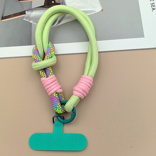 Modisches, zweifach gefaltetes, farblich passendes kurzes Seil. Einfaches kurzes Seil zum Aufhängen am Handgelenk. Zweilagiges Hängeseil. Festes und robustes Seil zum Aufhängen von Mobiltelefonen Image
