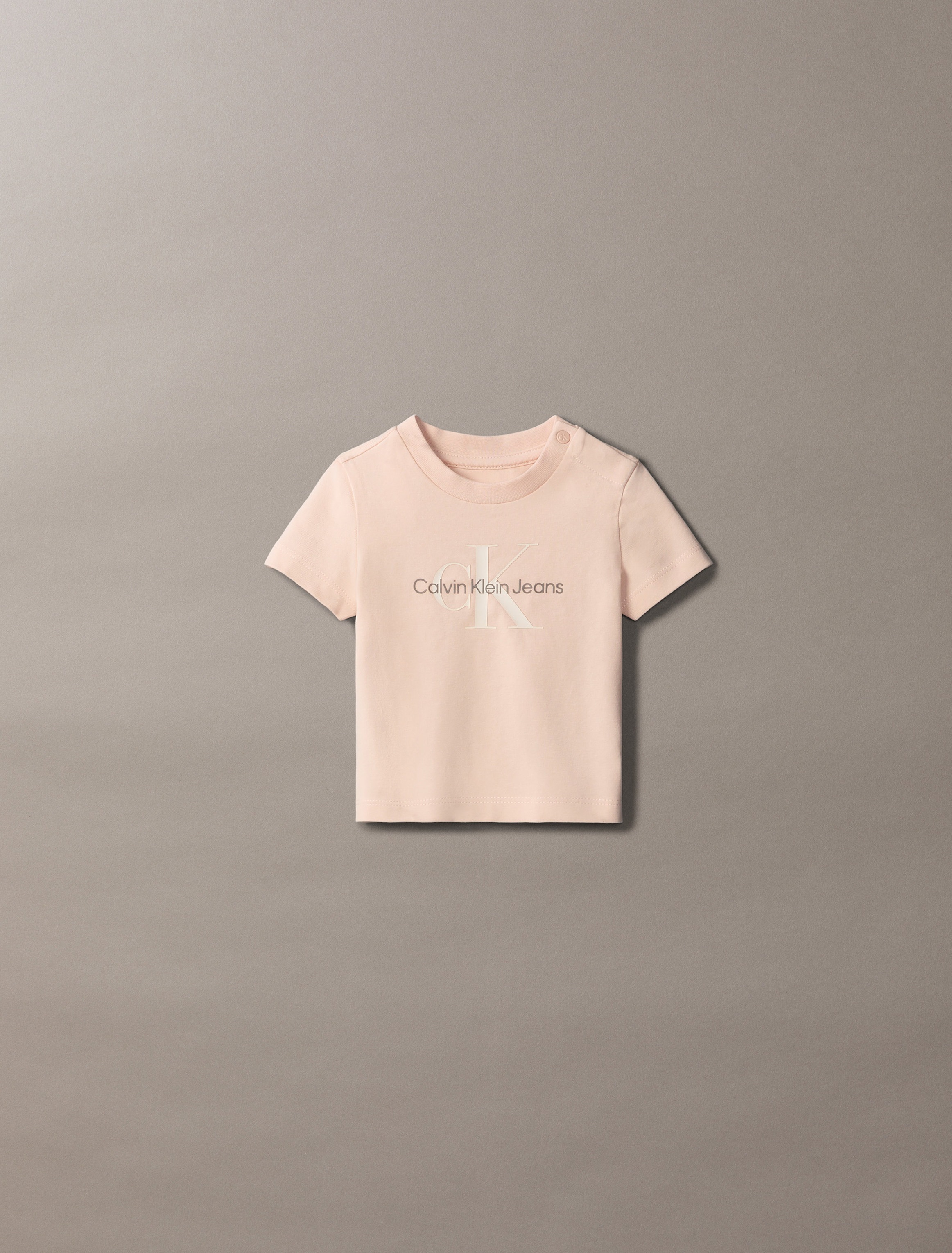 T-Shirt CALVIN KLEIN JEANS "MONOGRAM SS T-SHIRT", Baby, Gr. 98, spanish villa, Jersey, Obermaterial: 93% Baumwolle, 7% Elasthan, unifarben, regular fit hüftlang, Rundhals, Shirts, für Babys bis 2 Jahre, mit Logo-Druck Image