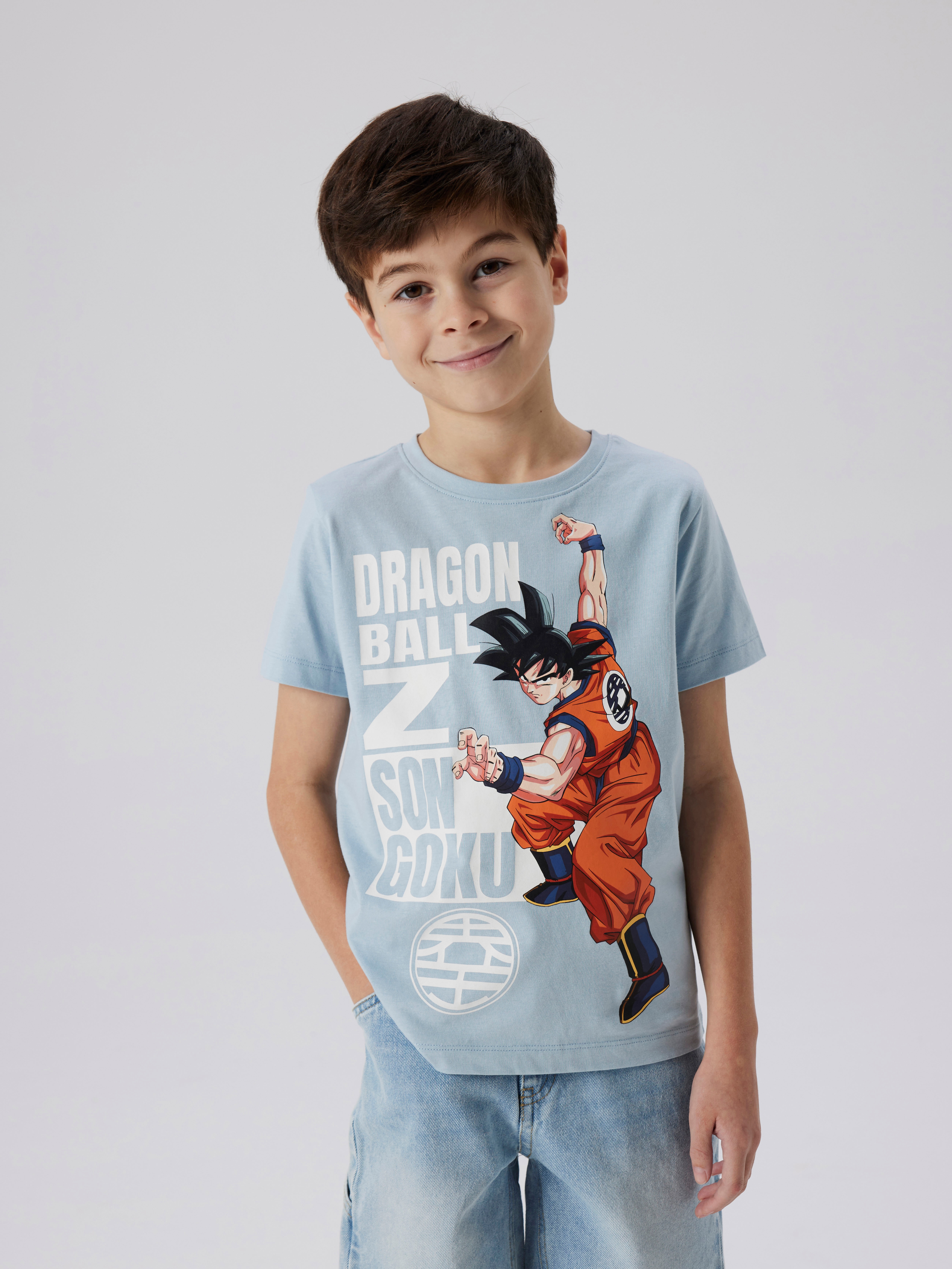 T-Shirt NAME IT "NKMFRITZ DRAGONBALL NREG SS TOP NOOS VDE", Jungen, Gr. 122 (128), blau (celestial blau (blank)), Jersey, Obermaterial: 100% Baumwolle, bedruckt, regular fit hüftbedeckend, Rundhals, abgesteppte Kante, Shirts, mit großem... Image